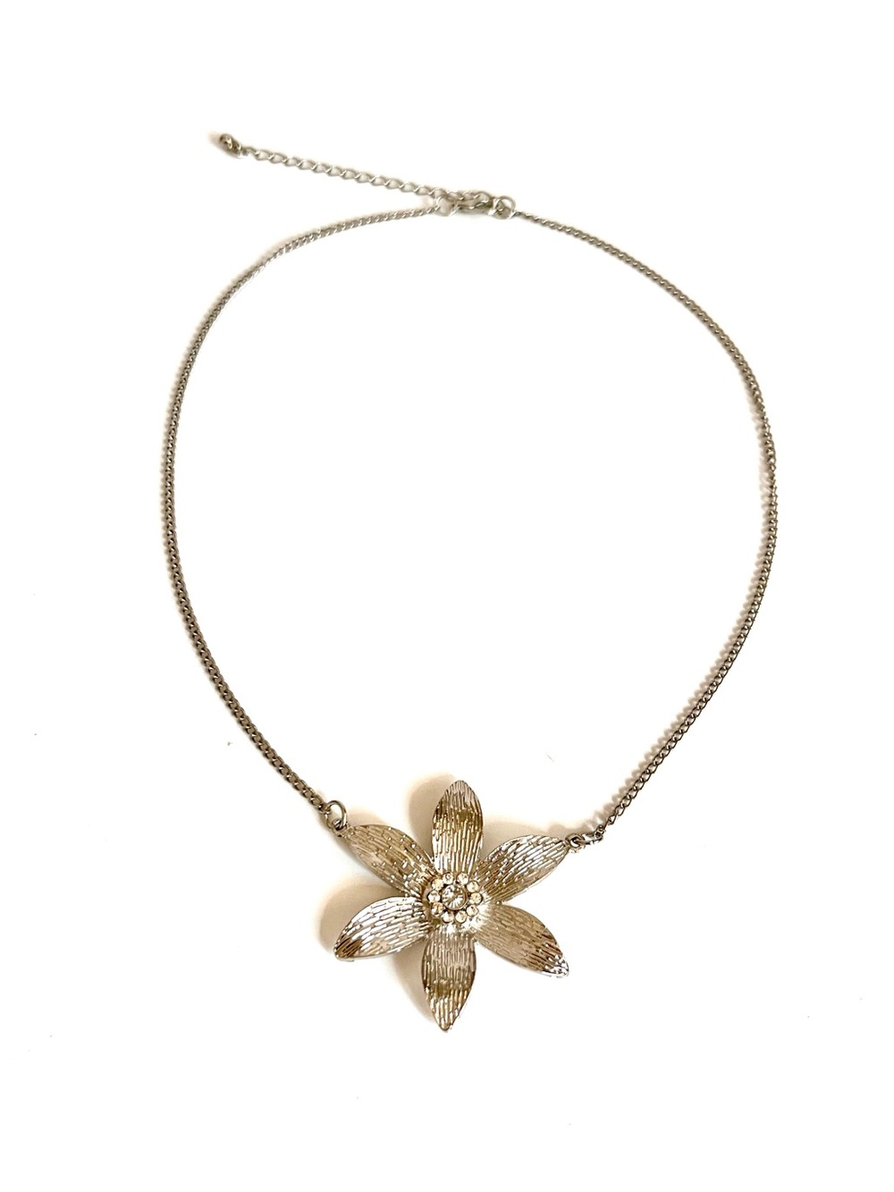 Elegant Silver-Tone Flower Statement Necklace with Rhinestone Center